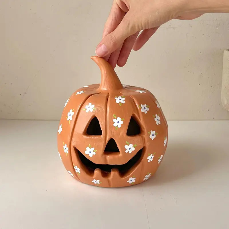 Halloween-themed Sculpd pottery kit floral pumpkin