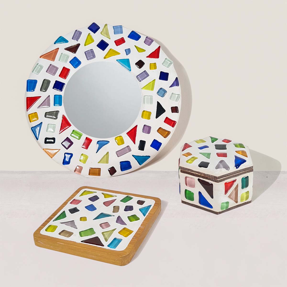 Sculpd Kids Mosaic Kit Mirror, Coaster and Trinket Dish finished and laid out on a table