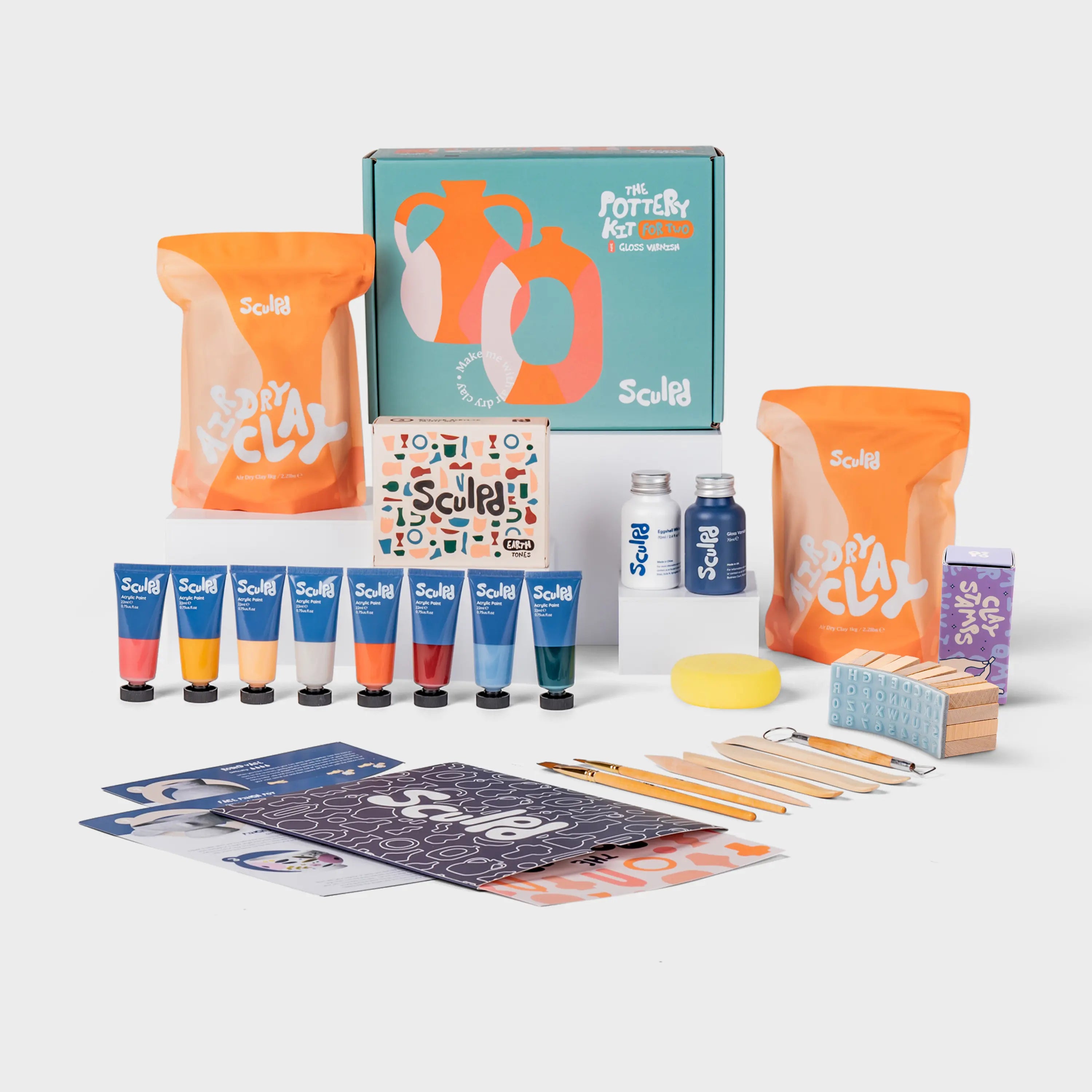 Pottery Kit for Two with Earth Paints and Letter Stamps in a Green Box