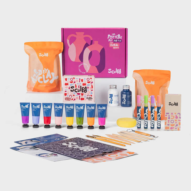 Sculpd pottery kit for two with floral paints, and modernist pens set