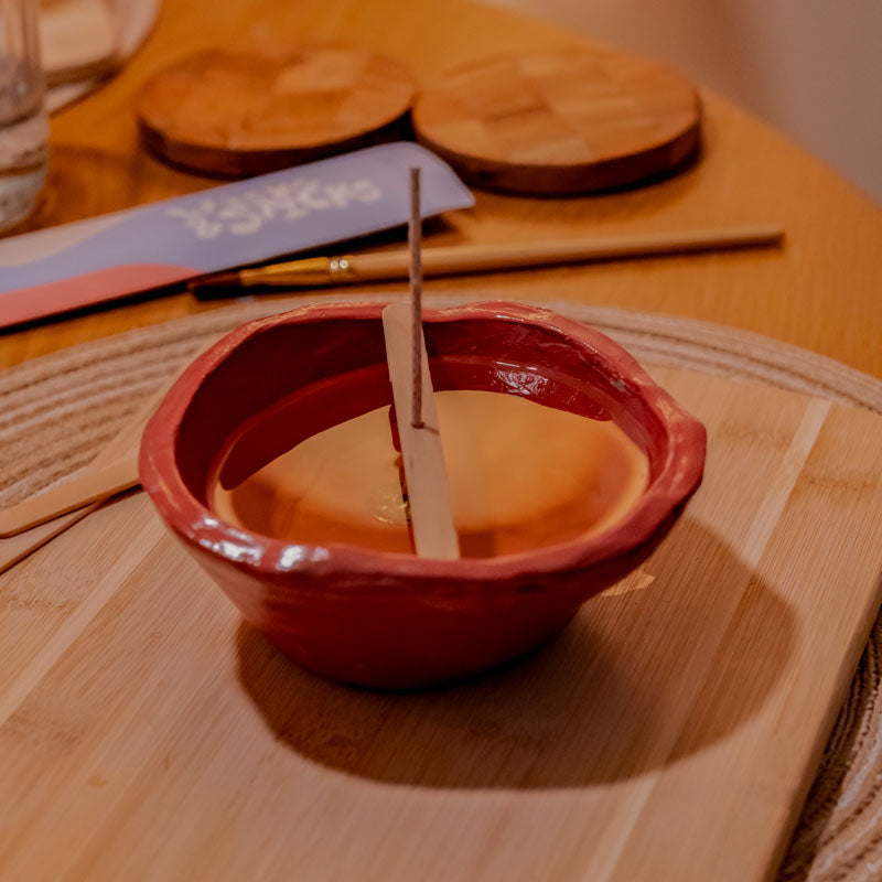 Sculpd Candle Making Kit Pot with centering wood and wick in freshly-poured wax