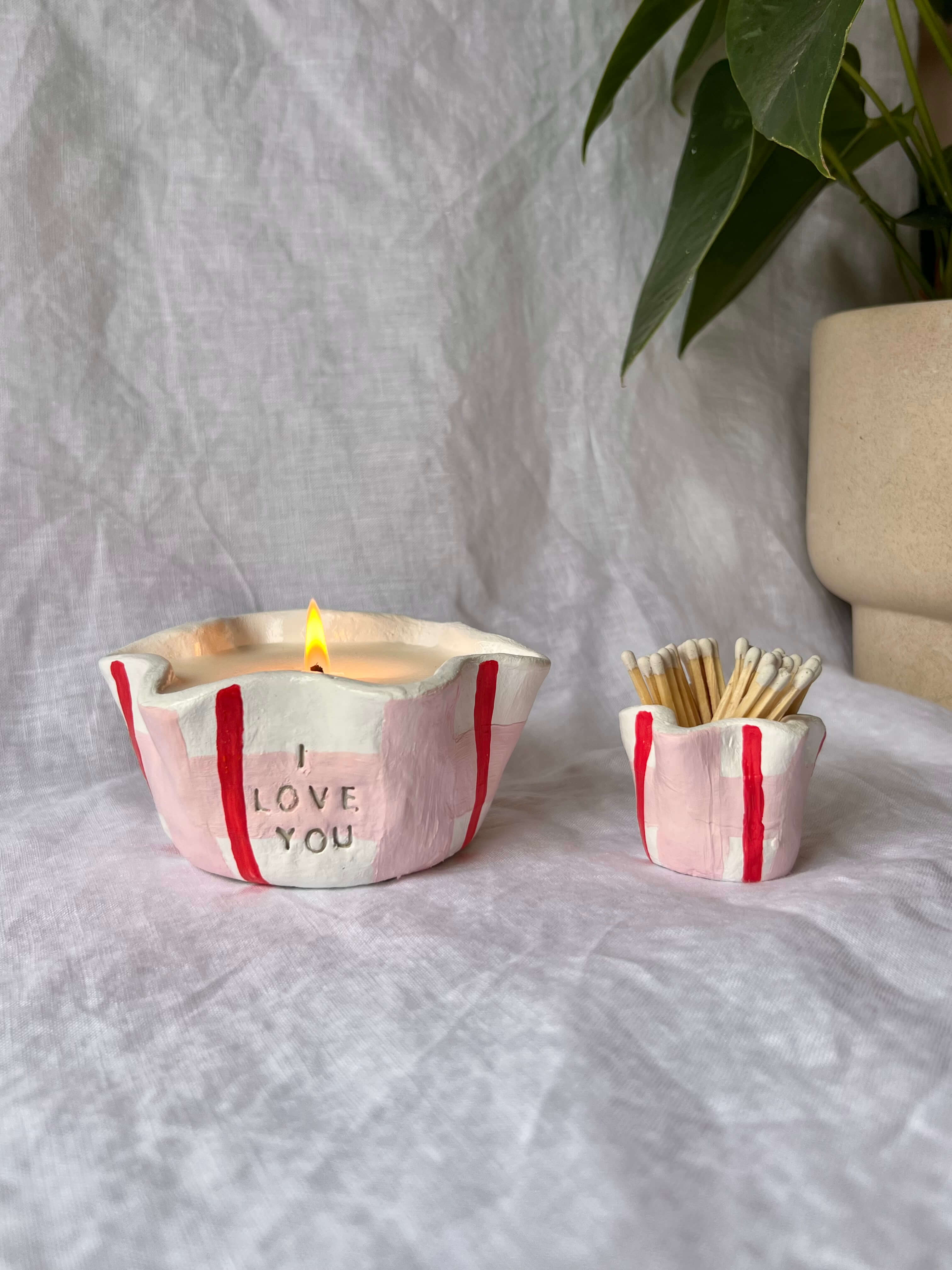 Sculpted candle with I love you message